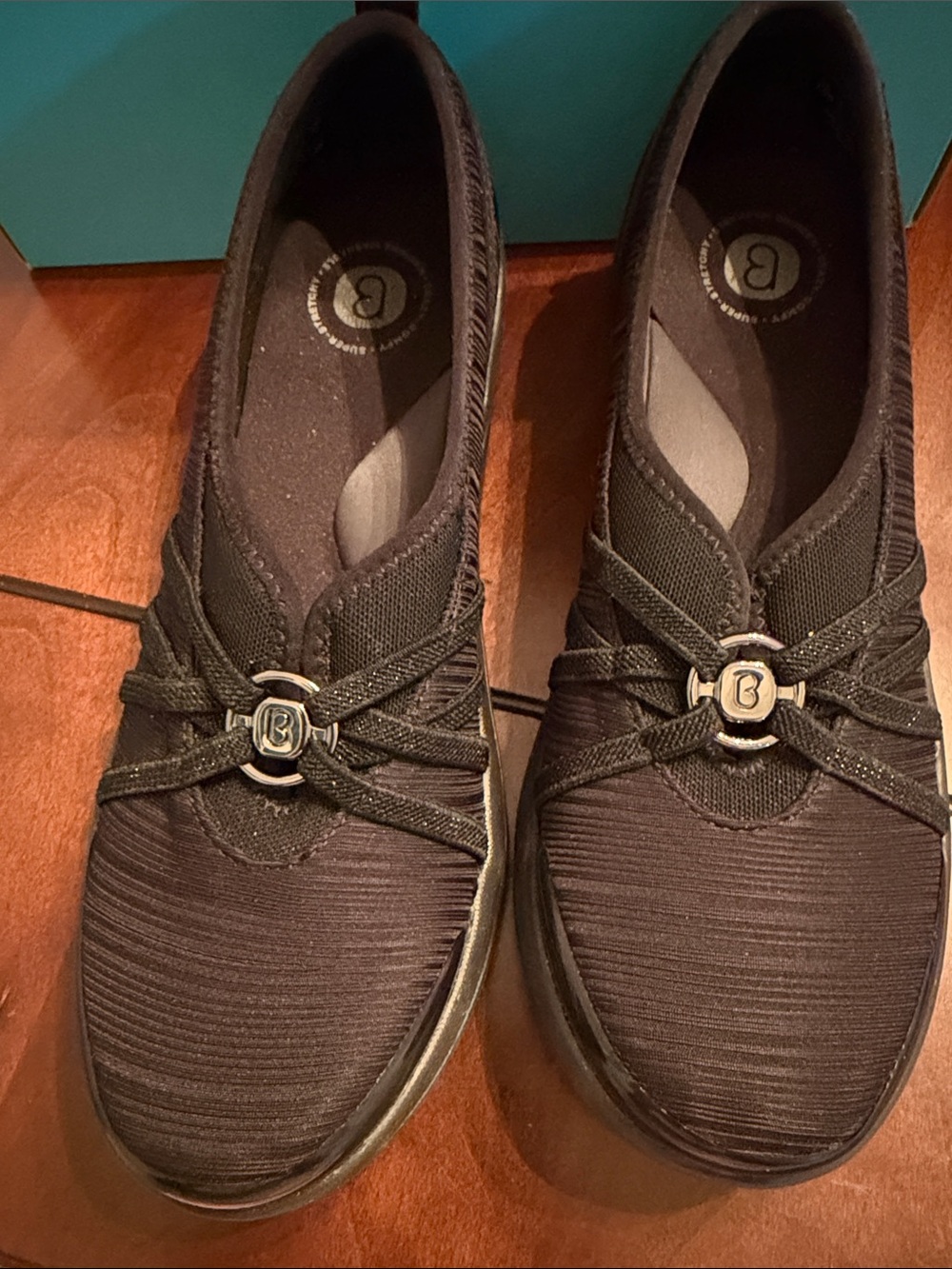 Bzees Women’s Black Slip-On Moccasins with Elastic Cross-Strap